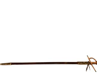 CT712 Faux Matador Spanish Sword Permanently Wrapped In Leather Sheath Beautiful design on metal parts. &nbsp;Sword is approximately 36" long.&nbsp;
