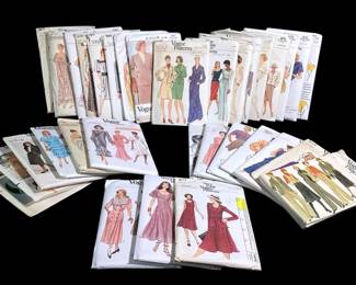 LUGR706 Vintage Vogue Pattern Assortment Collection of 33 patterns from the 70's and 80's. Includes patterns for clothing, outerwear, and accessories. Some patterns are cut, others are uncut.
