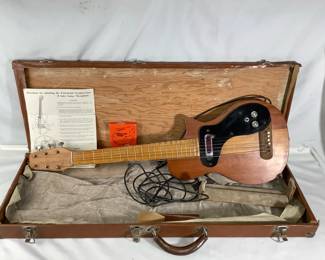 LUGR624 Vintage Electric Guitar This quitar has a DeArmond Rhythm Chief Guitar microphone attached with instruction sheet, Grover tuning pegs attached and guitar case included with Excelsior latches.&nbsp;
