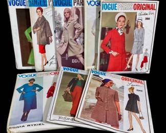 LUGR700 Vintage Vogue Paris Original, Patterns Collection of 8 different sewing patterns. Some patterns are cut, others are uncut.&nbsp;
