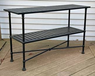 POTTERY BARN OUTDOOR CONSOLE TABLE | 
Slatted metal outdoor shelving from Pottery barn with x-stretcher on bottom, can work as a serving table or a plant stand! - h. 30.5 x w. 16 x l. 50 in