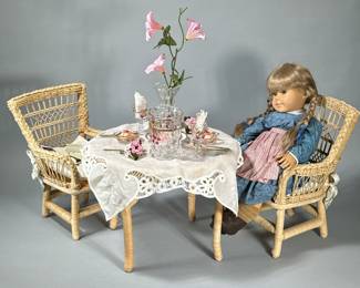 (4pc) American Girl Doll Wicker Tea Party | Including an American Girl Doll and a three-piece "Samantha's Birthday" furniture set (including two dolls chairs and tables) and tea party accoutrements, some original boxes included. - h. 18 in (doll)