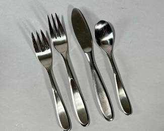 SET BLOOMINGDALE’S FLATWARE | Large lot of mixed stainless-steel flatware from Bloomingdale’s “A main course selection”.