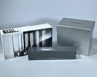 [NIB] FLATWARE & GLASSES | Including: mixed new in box Waterford fine flatware, set of 4 Tribeca 18.5 oz. glasses, and set of 6 Neiman Marcus champagne flutes.