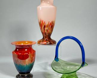 (3pc) ART GLASS VESSELS | Including two art glass vases with red and orange colors, and a blue and green glass handled basket. - h. 9.5 in (tallest)
