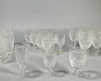 (34pc) WATERFORD CRYSTAL GLASSES | Briarcliff pattern Waterford cut crystal glasses including: 12 water goblets, 11 flutes, and 11 sherry glasses. - h. 5.24 x dia. 3 in (water goblets)
