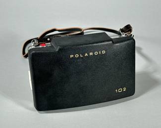 POLAROID 102 AUTOMATIC CAMERA | Polaroid Automatic 102 Land Camera in case with leather straps & owner’s manual. - h. 5 x w. 3 x l. 8 in