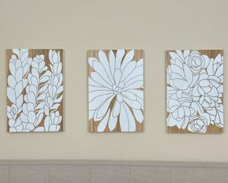 (3pc) WOOD CARVED ART | Set of three carved wood and painted wall panel artworks depicting white flowers on a natural wood ground. - w. 11.5 x l. 17 in