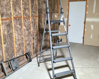 ALUMINUM POWDER COATED LADDER | Top step approximately 56 inches with a higher grab bar. - h. 87 x w. 24 x d. 7 in (folded)