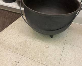 Large cast iron cauldron.