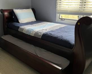 Pottery Barn twin trundle bed.