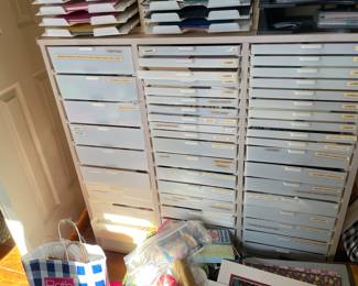 this cabinet holds card making supplies