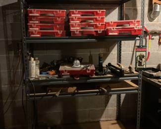 Electrical, plumbing and household items in containers, Racks, saws. Odds & Ends.