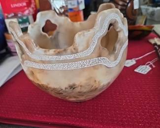 Stone carved bowl with etched accents