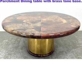 Lot 883 Karl Springer Attributed Real Parchment Dining table with brass tone base.