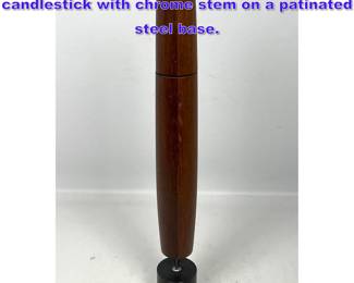 Lot 786 A Rosewood Varaflame butane candlestick with chrome stem on a patinated steel base.
