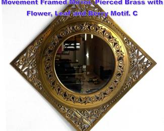 Lot 1085 PARKER BROTHERS Aesthetic Movement Framed Mirror. Pierced Brass with Flower, Leaf and Berry Motif. C