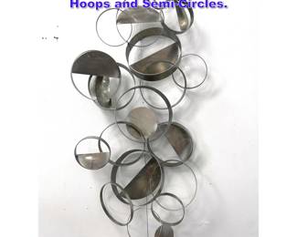 Lot 1237 Modernist Metal Wall Sculpture. Hoops and SemiCircles. 