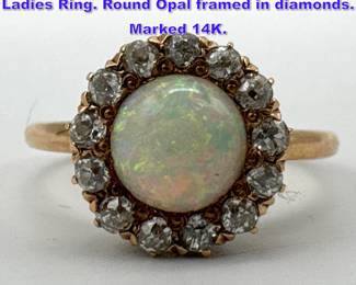 Lot 1153 14K YG Gold Opal and Diamond Ladies Ring. Round Opal framed in diamonds. Marked 14K. 