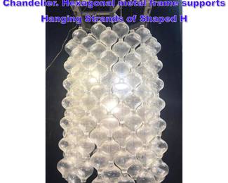 Lot 1010 KALMAR Venetian Glass Hanging Chandelier. Hexagonal metal frame supports Hanging Strands of Shaped H