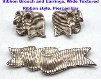 Lot 860 ANGELA CUMMINGS Sterling Silver Ribbon Brooch and Earrings. Wide Textured Ribbon style. Pierced Ear