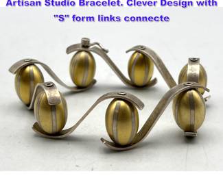 Lot 832 ELIZABETH GARVIN Sterling Silver Artisan Studio Bracelet. Clever Design with S form links connecte