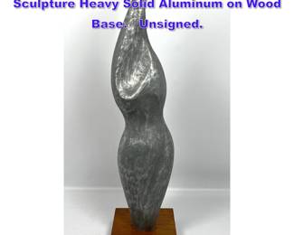 Lot 792 Large Abstract Female Torso Sculpture Heavy Solid Aluminum on Wood Base. Unsigned.