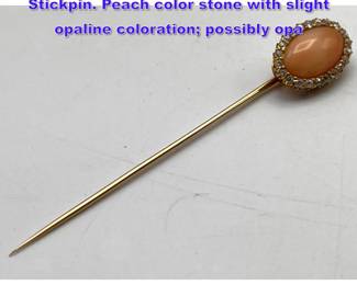 Lot 1133 14K Gold, Stone and Diamond Stickpin. Peach color stone with slight opaline coloration possibly opa