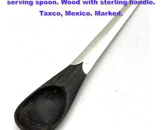 Lot 1212 William Spratling sterling silver serving spoon. Wood with sterling handle. Taxco, Mexico. Marked. 