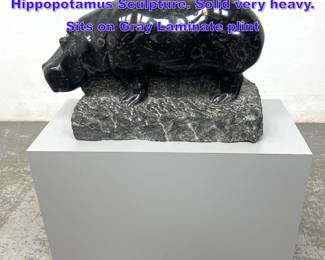 Lot 1101 Solid Fossilized Marble Stone Hippopotamus Sculpture. Solid very heavy. Sits on Gray Laminate plint