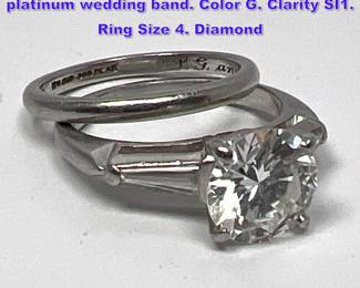 Lot 1146 1.58 CT Diamond ring and Tiffany platinum wedding band. Color G. Clarity SI1. Ring Size 4. Diamond