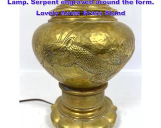 Lot 1086 Antique Hammered Brass Vessel Lamp. Serpent engraved around the form. Lovely Asian Brass Stand