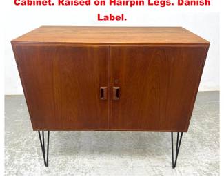 Lot 1952 Danish Modern Teak Two Door Cabinet. Raised on Hairpin Legs. Danish Label.