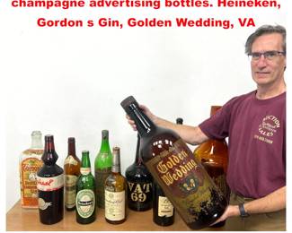 Lot 2135 11pc Huge scale liquor and champagne advertising bottles. Heineken, Gordon s Gin, Golden Wedding, VA
