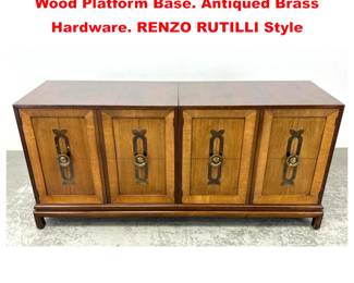 Lot 2088 Double 2 Door Cabinets on Low Wood Platform Base. Antiqued Brass Hardware. RENZO RUTILLI Style