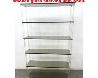 Lot 1668 Mid Century Modern Lucite and smoked glass shelving unit. Shelf.
