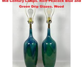 Lot 1867 Pr Tall Bottle form Glazed Pottery Mid Century Lamps. Rich Peacock Blue and Green Drip Glazes. Wood