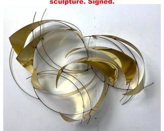 Lot 1664 C JERE 1989 brass wall sculpture. Signed.