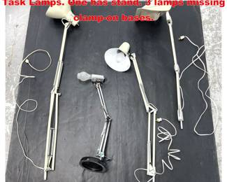 Lot 2008 4pc Modern Extension Arm Desk Task Lamps. One has stand. 3 lamps missing clampon bases.
