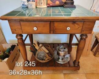 Tile top kitchen island fondue set, basket of utensils, rooster decor