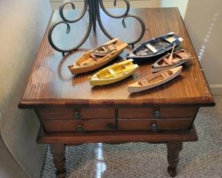 Vintage side tables and boat models