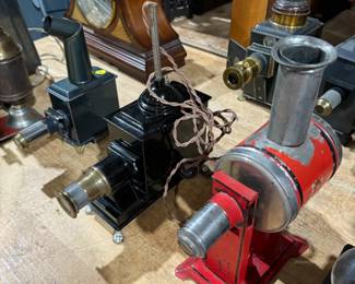 antique magic lantern collection, German magic lanterns, electric magic lanterns, different size magic lantern slides