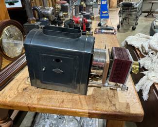 antique magic lantern collection, German magic lanterns, electric magic lanterns, different size magic lantern slides