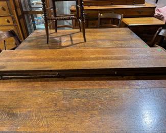 beautiful Victorian oak stick & ball dining table, 5 leaves, 7 cane seat chairs of assorted styles