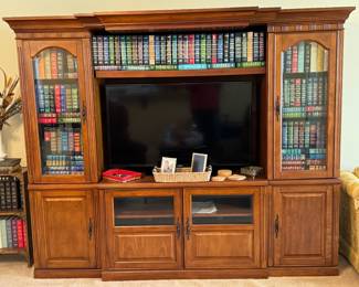 Beautiful entertainment center filled with great books for staging 