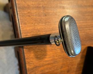 Top of change purse cane