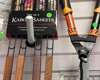 Kabob baskets and clippers in garage