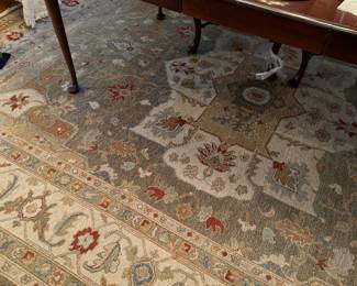Large rug in dining room 