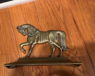 One of a Pair of brass horse doorstops