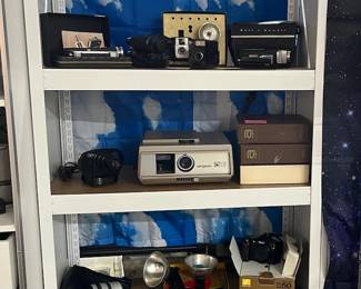 Vintage film + movie cameras / Argus slide projector / slide trays